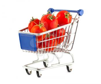Ripe red tomatoes in shopping cart isolated on white background