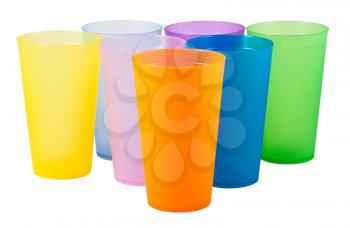 Plastic cups of various color isolated on white background