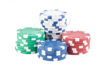 Four stacks of poker chips isolated on white background