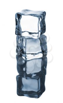 Pair of blue ice cubes isolated on a white reflecting table