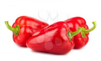 Three ripe red sweet peppers isolated on a white background