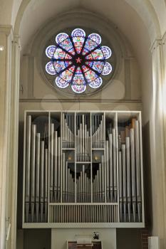 Church organ with pipes inside Braunschweig cathedral
