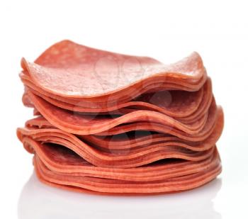 Royalty Free Photo of a Stack of Salami Slices