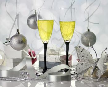 Glasses of champagne with christmas decorations 