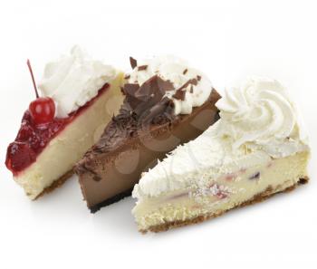 Cheesecake Slices On White Background