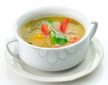 vegetable soup in a white soup cup 