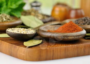 arrangement of spices on a wooden board , close up shot