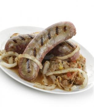 Fried Sausages With Sauerkraut And Onion