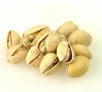 pistachio nuts isolated on white