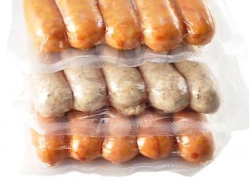 assortment of raw sausages in a plastic  package, close up