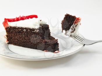 chocolate cake on a plate with fork