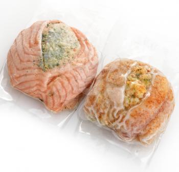 Frozen Stuffed Salmon And Tilapia Fillets In A Vacuum Package