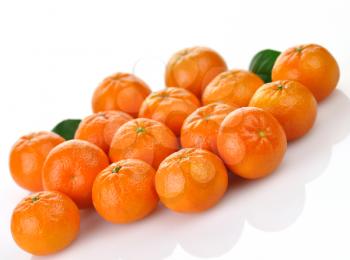Mandarins , close up  on a white background 
