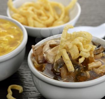 Hot and Sour Soup In A White Bowl