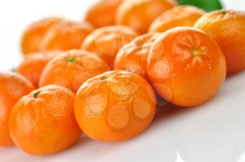 Mandarins , close up  on a white background
