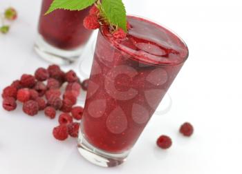 Frozen raspberry smoothie with fresh berries 