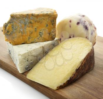 Gourmet Cheese Assortment On A Wooden Board 