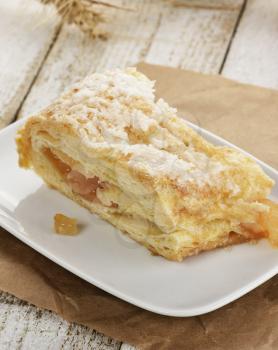 An Apple Strudel In A White Dish 