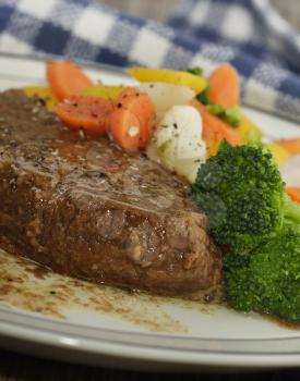 Plate Of Baked Beef With Vegetables