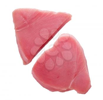 Raw yellowfin tuna steaks isolated on a white background