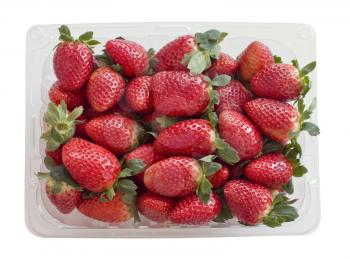 Fresh strawberries in a plastic container isolated on white background