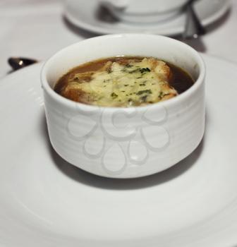 french onion soup in a white bowl