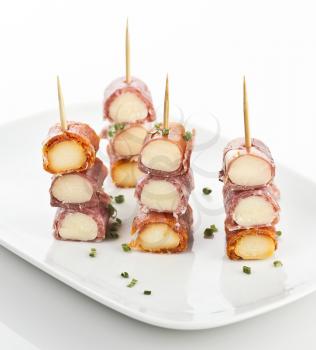 Appetizers with Gourmet Meat And Salami Rolls With Cheese
