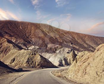Desert road leading through Death Valley National Park, California USA.Artist's Drive.