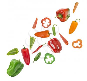 Assorted colorful varieties of hot and sweet peppers isolated on white background