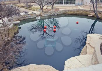 SANTA ROSA, NM, USA - March 11 ,2019. At 80 feet deep with clear blue water, the Blue Hole on Route 66 in Santa Rosa, NM. The Blue Hole of Santa Rosa is a circular, bell-shaped pool east of Santa Rosa