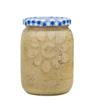 Sauerkraut in a glass jar isolated on white background