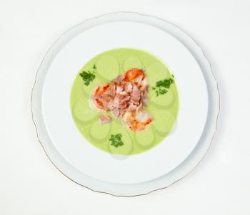 Pea soup with shrimps and bacon