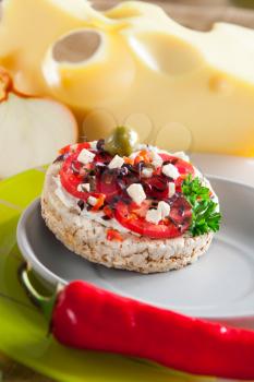 Healthy food, crispbread with cheese and vegetables