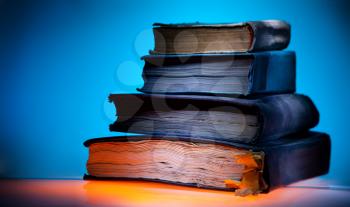 Old books, mystical blue light  background