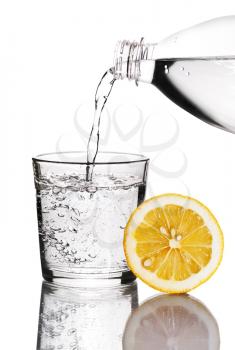 Drink with lemon, isolated on white