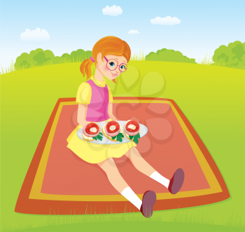 Girl on picnic and plate of sandwiches