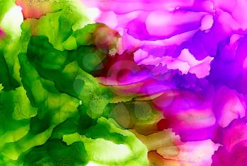 Abstract paint purple green textured flow.Colorful background hand drawn with bright inks and watercolor paints. Color splashes and splatters create uneven artistic modern design.