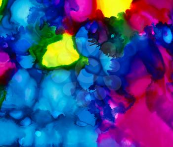 Bright blue and pink paint with yellow spots.Colorful background hand drawn with bright inks and watercolor paints. Color splashes and splatters create uneven artistic modern design.