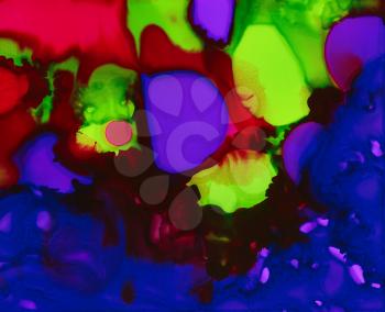 Bright purple pink green paint spots.Colorful background hand drawn with bright inks and watercolor paints. Color splashes and splatters create uneven artistic modern design.
