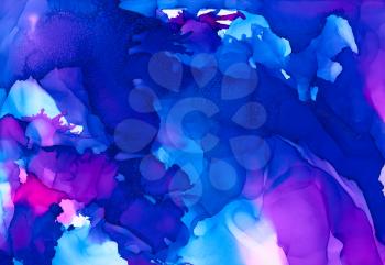 Blue pink cloudy texture.Colorful background hand drawn with bright inks and watercolor paints. Color splashes and splatters create uneven artistic modern design.