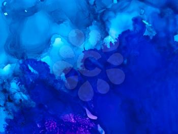 Deep blue color textured.Colorful background hand drawn with bright inks and watercolor paints. Color splashes and splatters create uneven artistic modern design.