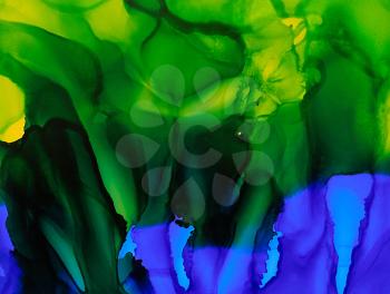 Deep green yellow bright  blue paint texture.Colorful background hand drawn with bright inks and watercolor paints. Color splashes and splatters create uneven artistic modern design.