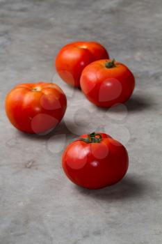 tomatoes on cement ground
