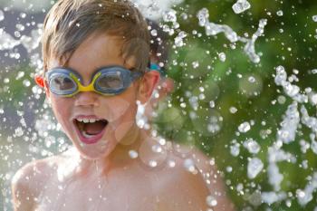 Young child playing in the water