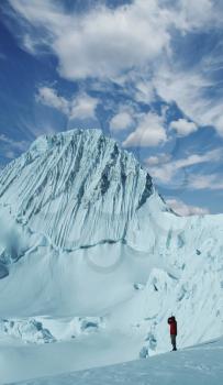 Royalty Free Photo of a Climber at the Alpamayo Peak in the Cordilleras