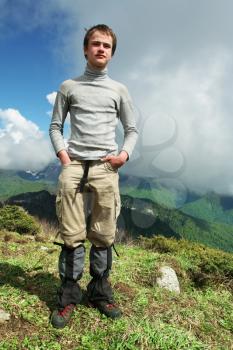 Royalty Free Photo of a Boy Hiking in the Mountains