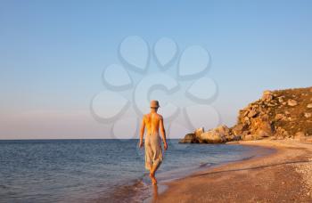 Royalty Free Photo of a Boy on a Beach