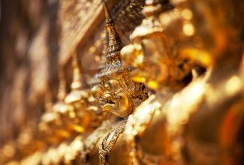 Royalty Free Photo of Golden Garuda Sculptures at the Royal Palace in Bangkok Thailand