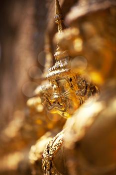 Royalty Free Photo of Golden Garuda Sculptures at the Royal Palace in Bangkok Thailand