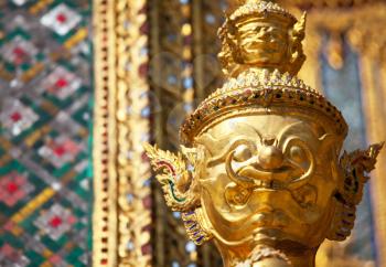 Royalty Free Photo of a Golden Garuda Sculpture at the Royal Palace in Bangkok Thailand